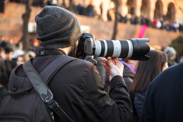 Photographer hand camera in demonstration