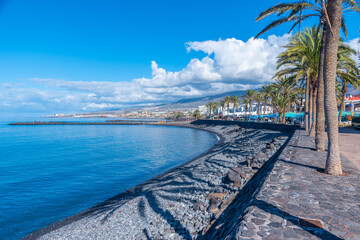 Seaside promenade at Playa de las Americas, Tenerife, Canary Islands, Spain © dudlajzov