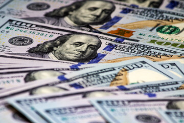 New design US currency one hundred dollar bills background