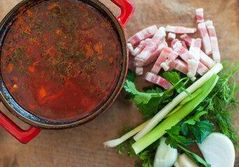 photo for menu, Russian borscht with sour cream garlic pepper and sauce, Ukrainian borscht with sour cream, food background, Food and healt Closed bowl top view