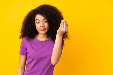 Young african american woman over isolated background making Italian gesture