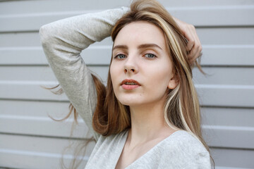 Naklejka premium beautiful young woman in blouse, portrait of cute attractive caucasian model