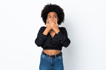 Young African American woman isolated on white background covering mouth with hands