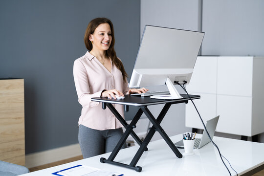 Adjustable Height Desk Stand In Office