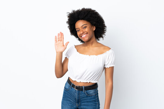 Young African American Woman Isolated On White Background Saluting With Hand With Happy Expression