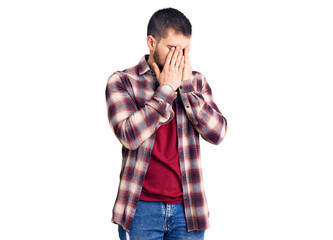 Young handsome man wearing casual shirt rubbing eyes for fatigue and headache, sleepy and tired expression. vision problem