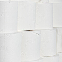 Toilet paper rools stacked on top of each other