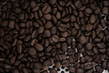 top view of fresh roasted coffee beans background