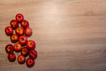 Abstract Wooden Background with Apples on one Side with Copy Space