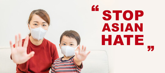 top asian hate.Stop spread of racism.Asian mother and boy child mask fear xenophobia home.bully school.family protester.hate crimes against asian.Support Asian american communities.Equality.Racism.