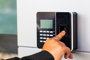 Staff push down electronic control machine with finger scan to access the door of control room or data center.