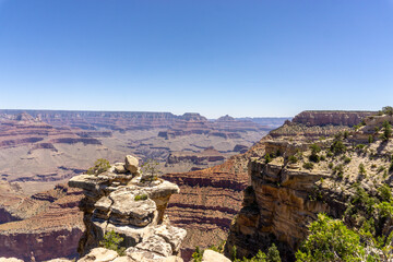Clear skies and The Grand Canyon. that is a huge valley cut by the Colorado River.
