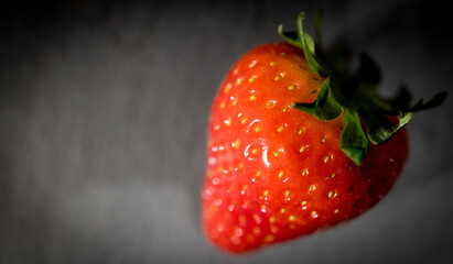 Strawberries on a table in close-up - studio photography