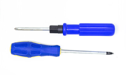 pair of screwdrivers with a blue plastic handle lie parallel to each other on a white isolated background