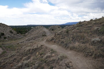 Dirt hiking trail through dry mountainous terrain
