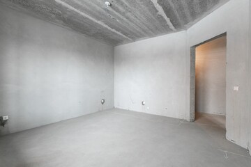 interior of the apartment without decoration in gray colors. rough finish