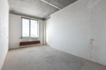interior of the apartment without decoration in gray colors. rough finish
