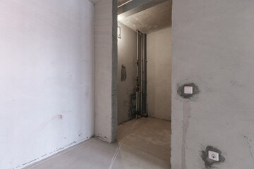 interior of the apartment without decoration in gray colors. rough finish