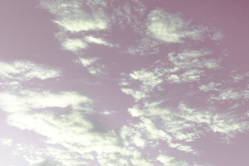 Fototapeta na wymiar Purple sky and white clouds.