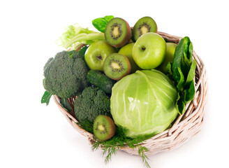 fresh vegetables with leaves - broccoli, kiwi, celery, spinach, kale, grapes and apple isolated on white background