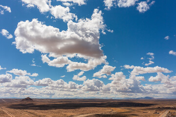 the clouds over the mountains