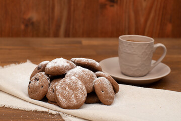 Soft cookies on linen towel, front view, close-up, selective focus