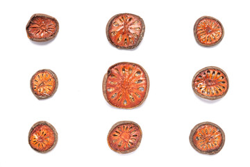 Dried Bael fruit on white background. No clipping path.