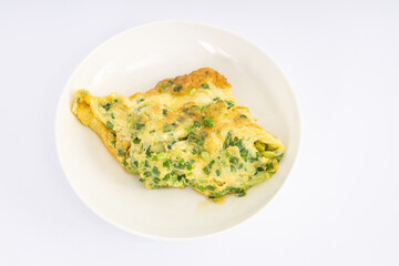 A plain home fried egg with leeks