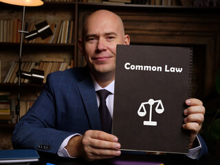 Legal concept about Common Law with phrase on the piece of paper.