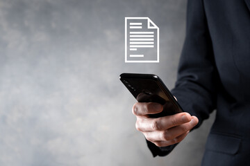 Businessman man holding a document icon in his hand Document Management Data System Business Internet Technology Concept. Corporate data management system DMS