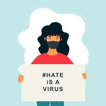 Stop Asian Hate‬‬. Hashtag to support asian community during the covid-19 pandemic. Stop racism. woman wearing protective face mask and holding banner against bullying, hate and violence.