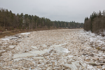 City Ogre, Latvia.Ice flows along the river.Travel photo.