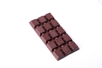 Broken dark chocolate broken stack isolated on white background