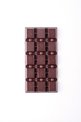 Broken dark chocolate broken stack isolated on white background