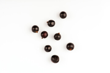 Black currant. Ripe juicy black currant berries isolated on white background