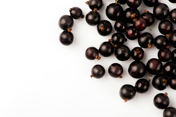 Black currant. Ripe juicy black currant berries isolated on white background