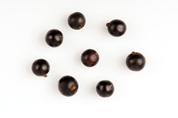 Black currant. Ripe juicy black currant berries isolated on white background