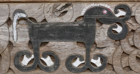 Closeup view of traditional Ngada people or tribe wood carving of black horse symbol in Bena village near Bajawa, Flores, East Nusa Tenggara, Indonesia