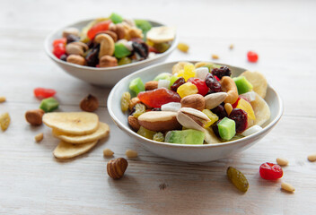 Bowls with various dried fruits and nuts