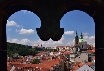 Prague is characteristic with its red rooftops, here shown in summer with blue skies, Central...