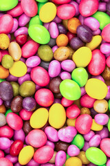 Fototapeta na wymiar candy set pink yellow vertical pattern bright jelly beans