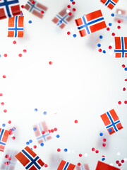 Norwegian independence day, Constitution day, may 17. holiday of freedom, victory and memory. concept of patriotism and faith. paper confetti and mini flags on white foggy background