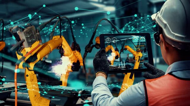 Smart industry robot arms modernization for innovative factory technology . Concept of automation manufacturing process of Industry 4.0 or 4th industrial revolution and IOT software control operation.