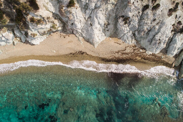 Top view aerial image from drone of an stunning beautiful sea landscape beach with turquoise water. Beautiful Sand beach with turquoise water,aerial drone shot. 'Foca' Izmir Turkey