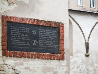 LVIV, UKRAINE - FEBRUARY, 2021: Ruins of Synagogue Golden Rose and memorial plaque.