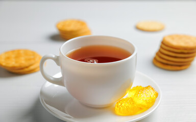 High resolution photo: Tea cup with crackers and some marmelade