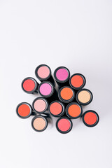 Jars of powder close-up on a mirror surface