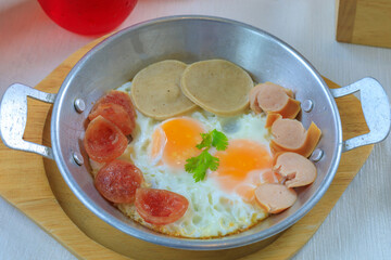 Egg in pan Thaifood style culture. for breakfast.