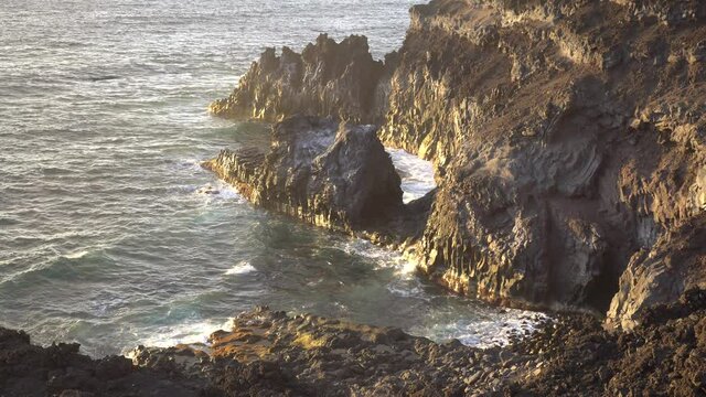 Waves breaking over rocks in la Palma Island