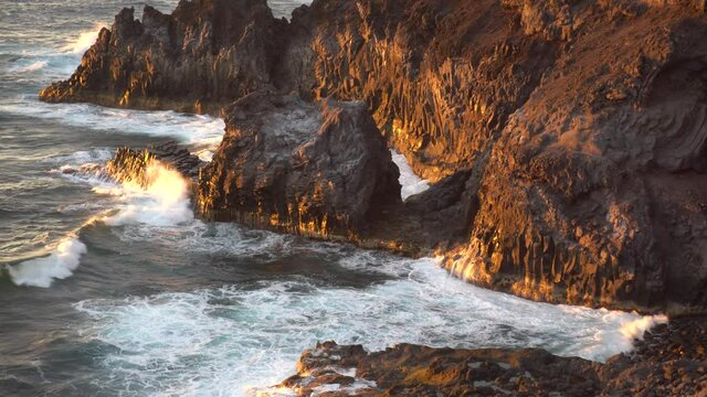 Waves breaking over rocks on  la Palma 